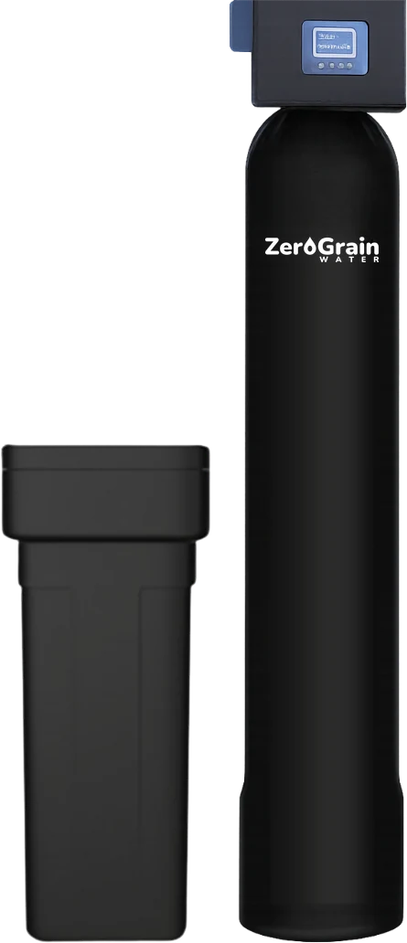 Softener with its salt-holding brine tank, set up where a house's water supply comes indoors